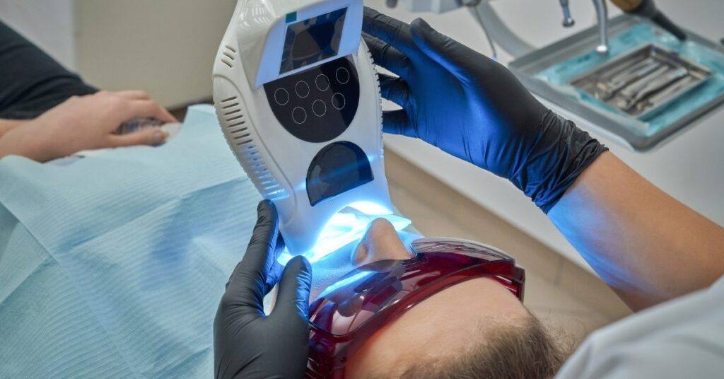 dental whitening process at clinic